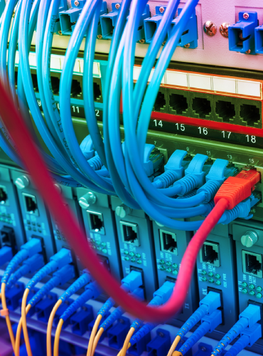Elite Infotech's fiber-optic network infrastructure in Saudi Arabia with Arab engineers monitoring secure connections